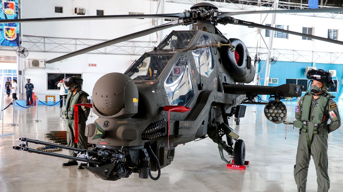 MANILA, PHILLIPPINES - APRIL 06: T129 Atak helicopter and Philippine soldiers are seen at Col Jesus Villamor Air Base in Manila, Phillippines on April 06, 2022. The first overseas delivery of the Atak helicopter was realized, with two T129 Atak Attack and Tactical Reconnaissance Helicopters and a C-295 transport aircraft entering the inventory of the Philippines army. (Photo by Goksel Yildirim/Anadolu Agency via Getty Images)