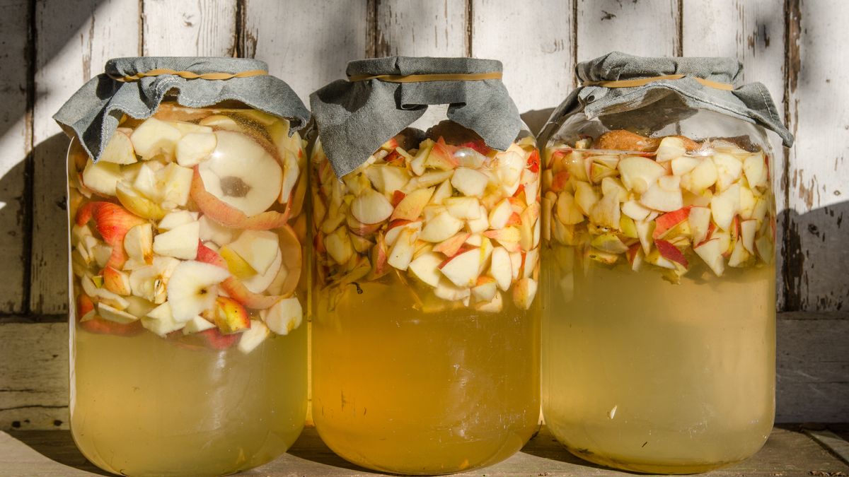 Making of apple vinegar - apple pieces floating on water in a glassGlasses of raw apple vinegar standing in sunshineapple, vinegar, homemade, diy, organic, original, cider, food, alternative, bio, bottle, drink, fresh, fruit, glass, healthy, herbal, ingredient, juice, liquid, medicine, rustic, spice, sweet, therapy, vintage, wood, wooden, aging, aroma, detoxification, body, cosmetic, dermatology, face, folk, hair, skin, care, herbs, holistic, homeophaty, medical, raw, relax, soul, wellness, wisdom, make, prepare, apple, vinegar, homemade, diy, organic, original, cider, food, alternative, bio, bottle, drink, fresh, fruit, glass, healthy, herbal, ingredient, juice, liquid, medicine, rustic, spice, sweet, therapy, vintage, wood, wooden, aging, aroma, detoxification, body, cosmetic, dermatology, face, folk, hair, skin, care, herbs, holistic, homeophaty, medical, raw, relax, soul, wellness, wisdom, make, prepare