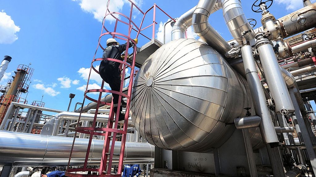 Oil And Gas Plant Operated By NIS Gazprom Neft
An employee climbs an access ladder before inspecting valves at the oil and gas refinery operated by Naftna Industrija Srbije AD (NIS), a unit of OAO Gazprom Neft, in Pancevo, Serbia, on Thursday, June 5, 2014. Gazprom Neft expects its controlling stake in NIS will bring cash flows of about $140 million this year and next year from dividend payouts and repayments on loans it made to the Serbian company, an official said in February. Photographer: Oliver Bunic/Bloomberg via Getty Images
Bloomberg
EMEA; EUROPE, SERBIA; SERBIAN, CRUDE OIL; OIL; ENERGY; FUEL, REFINERY; OIL; GAS; ENERGY, INDUSTRY: INDUSTRIAL, INDUSTRY: INDUSTRIAL; FACTORY;