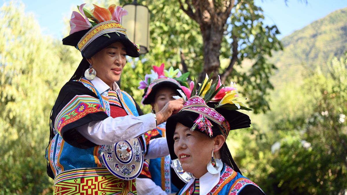 GANNAN, CHINA - SEPTEMBER 26: Tibetan women wear brocade belts on September 26, 2024 in Gannan Tibetan Autonomous Prefecture, Gansu Province of China. The 1,000-year-old Qiang-Tibetan brocade weaving technique is well inherited. Brocade belt is a colorful, beautiful pattern for Tibetan women in Zhouqu to tie their waist, tie boots, hair and even embellish their dress. (Photo by Jiumei Danzeng/China News Service/VCG via Getty Images)