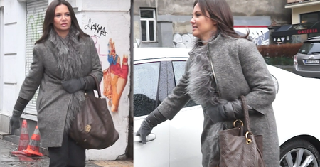 Rusin wychodzi z pracy z torebką Louis Vuitton