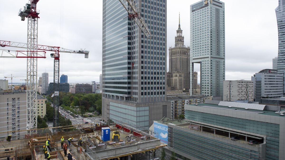 Builders are seen at the Skysawa worksite on September 2, 2020 in Warsaw, Poland. Skysawa is a High rise Class A offices project that will deliver approx. a total of 39.000 sq. m. of work place. Construction deadline is around Q2 2022. (Photo by Aleksander Kalka/NurPhoto via Getty Images)