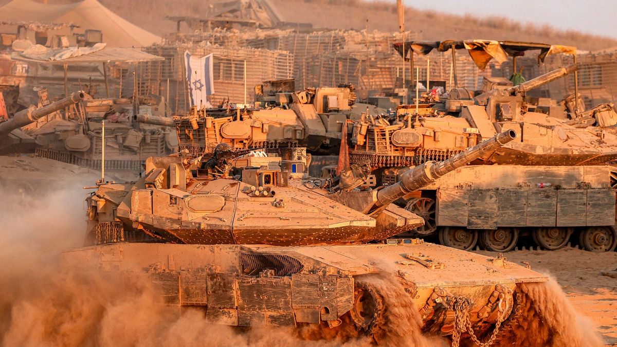 Temporary
An Israeli army Merkava main battle tank moves past other vehicles stationed along the border fence with the Gaza Strip in southern Israel on September 12, 2025. Israel's military said on September 9 that it will act with "great force" in Gaza City and told residents to leave as it stepped up a deadly assault on the Palestinian territory's largest urban centre. (Photo by Jack GUEZ / AFP)
JACK GUEZ