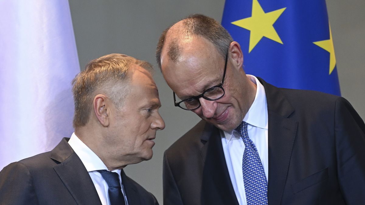 BERLIN, GERMANY - DECEMBER 01: Polish Prime Minister Donald Tusk and German Chancellor Friedrich Merz hold a joint press conference in Berlin, Germany on December 01, 2025. (Photo by Halil Sagirkaya/Anadolu via Getty Images)