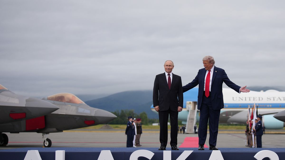 ANCHORAGE, ALASKA - AUGUST 15: U.S. President Donald Trump (R) greets Russian President Vladimir Putin as he arrives at Joint Base Elmendorf-Richardson on August 15, 2025 in Anchorage, Alaska. The two leaders are meeting for peace talks aimed at ending the war in Ukraine.  (Photo by Andrew Harnik/Getty Images)