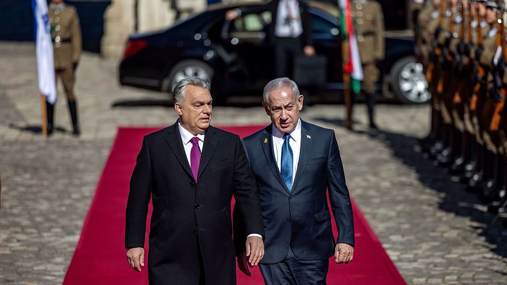 Hungarian Prime Minister Viktor Orban Hosts Israeli Prime Minister Benjamin Netanyahu, Despite ICC Warrant Out For His Arrest
BUDAPEST, HUNGARY - APRIL 3: Hungarian Prime Minister Viktor Orbán (L) receives Israeli Prime Minister Benjamin Netanyahu on April 3, 2025 in Budapest, Hungary. Netanyahu's scheduled four-day visit to Hungary marks his first foreign trip to a country under the jurisdiction of the International Criminal Court (ICC) since the tribunal issued a warrant for his arrest in November, accusing the Israeli prime minister of perpetrating war crimes in Gaza. Despite Hungary being a founding member of the ICC, Hungarian Prime Minister Viktor Orban has condemned the international court's allegations against Netanyahu. Shortly before Netanyahu's visit, a spokesman for Orban announced that Hungary would be withdrawing from the ICC, starting the process today. (Photo by Janos Kummer/Getty Images)
Janos Kummer