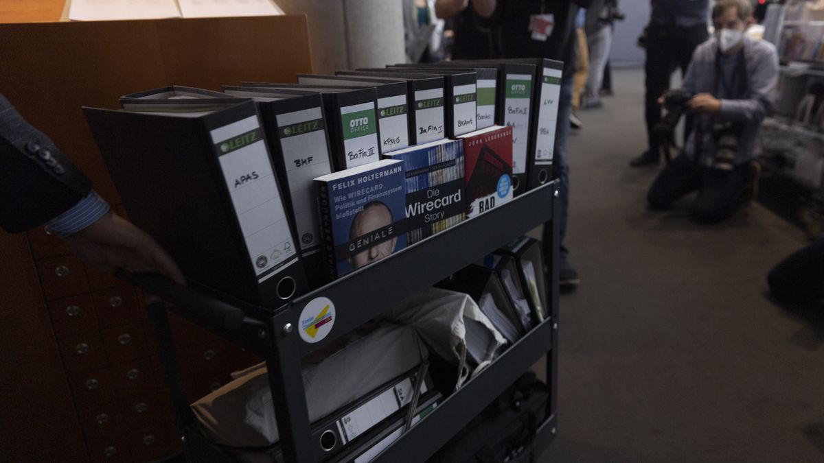 BERLIN, GERMANY - APRIL 22: Files are brought into room before German Minister of Finance Olaf Scholz (not seen) arrives for questioning at the Bundestag commission investigating the Wirecard scandal at Paul-Loebe-Haus on April 22, 2021 in Berlin, Germany. Wirecard, a German digital payments processor that was very active in Asia, declared bankruptcy last year following revelations of deceptive accounting to the tune of EUR 2 billion. The Bundestag commission is investigating, among other issues, why government regulators failed to uncover Wirecard's fraudulent accounting. Former Wirecard chief operating officer Jan Marsalek is a fugitive also being investigated for possible ties to Russian intelligence services. (Photo by Maja Hitij/Getty Images)
