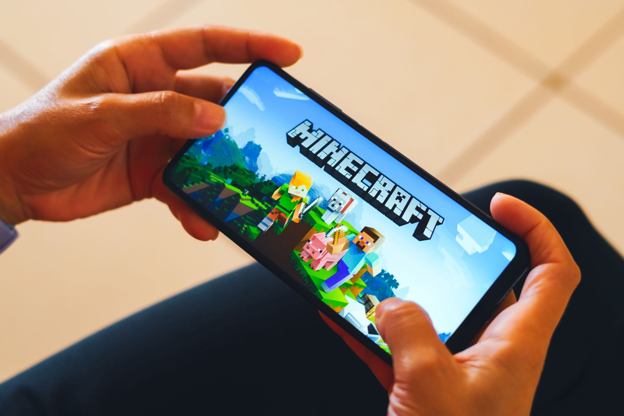 BRAZIL - 2023/05/12: In this photo illustration, the Minecraft logo is displayed on a smartphone screen. (Photo Illustration by Rafael Henrique/SOPA Images/LightRocket via Getty Images)