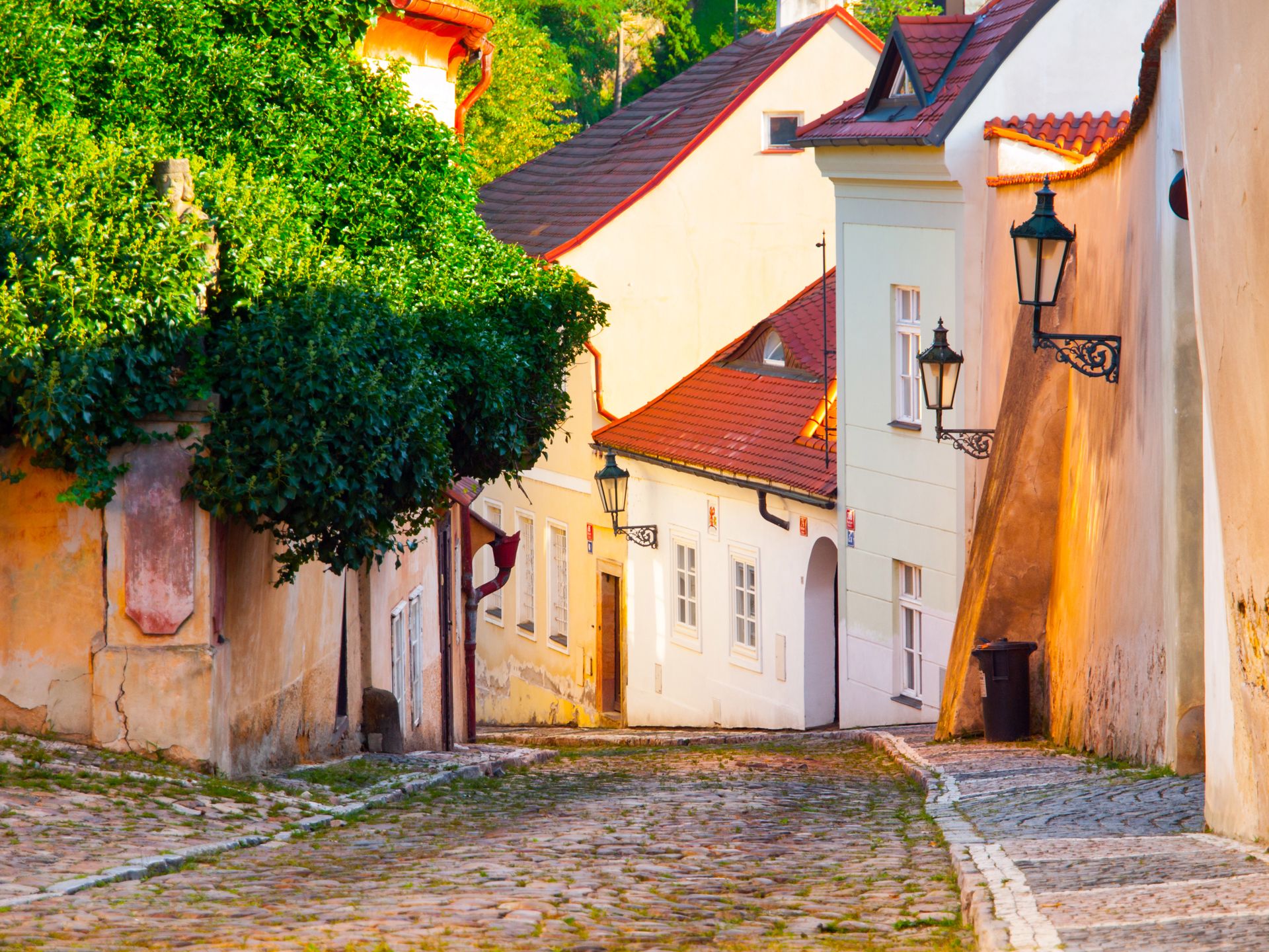 Old medieval narrow cobbled street and small ancient houses of Novy Svet, Hradcany district, Prague, Czech Republic. 