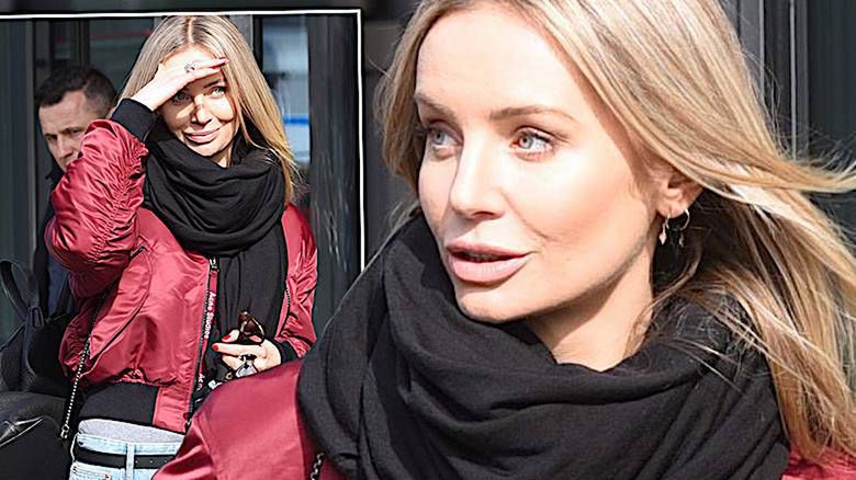 Agnieszka Woźniak-Starak w bordowej kurtce