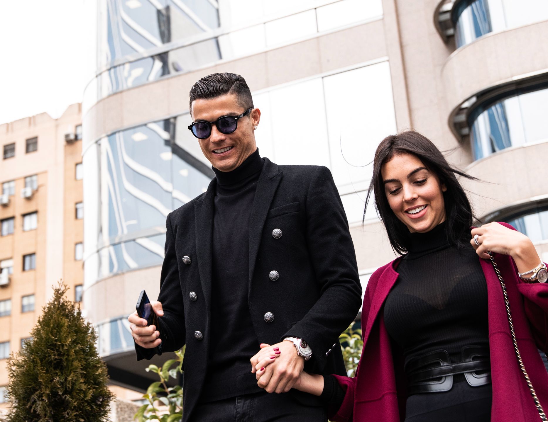 MADRID, SPAIN - 2019/01/22: Portuguese soccer player Cristiano Ronaldo leaves from the provincial court of Madrid with his girlfriend Georgina Rodriguez from his tax evasion trial. (Photo by Jesus Hellin/SOPA Images/LightRocket via Getty Images) 