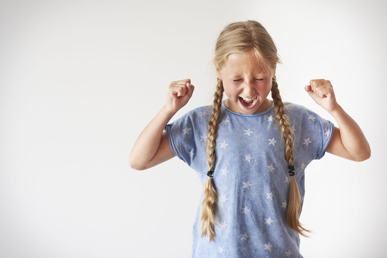 Angry little girl screaming very loud