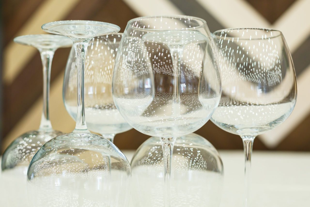 Glass glasses with drinks stand on a table