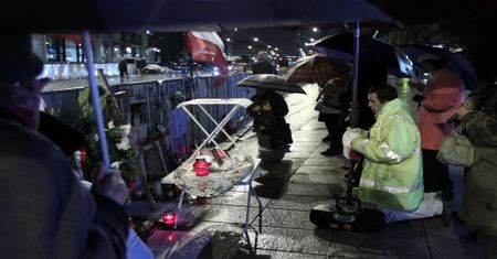 Krakowskie Przedmieście w deszczu