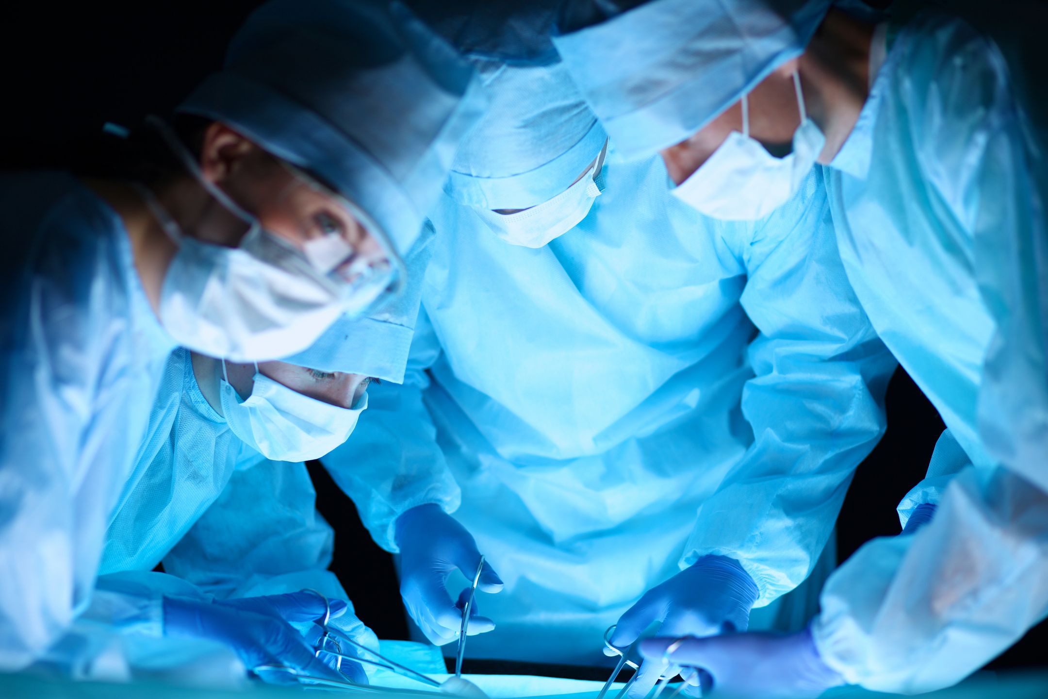 Surgery team in the operating room . 