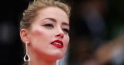 Amber Heard wygina się na czerwonym dywanie. Tak musi walczyć o uwagę
