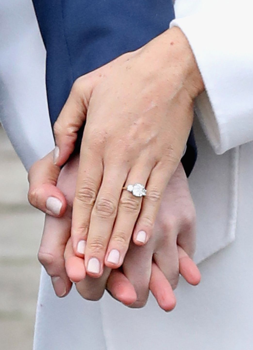 LONDON, ENGLAND - NOVEMBER 27:  Prince Harry and Meghan Markle during an official photocall to announce the engagement of Prince Harry and actress Meghan Markle at The Sunken Gardens at Kensington Palace on November 27, 2017 in London, England.  Prince Harry and Meghan Markle have been a couple officially since November 2016 and are due to marry in Spring 2018.  (Photo by Chris Jackson/Getty Images) 
