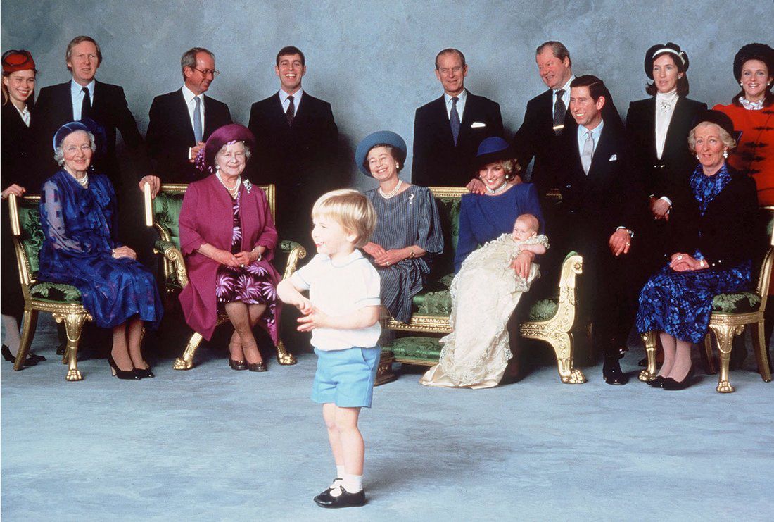 WINDSOR - DECEMBER 21:   Surrounded by Royal relatives and godparents who are amused at the antics of young Prince William, Prince Harry is christened at Windsor Castle on December 21, 1984 in Windsor, England . (Photo by Anwar Hussein/Getty Images) 