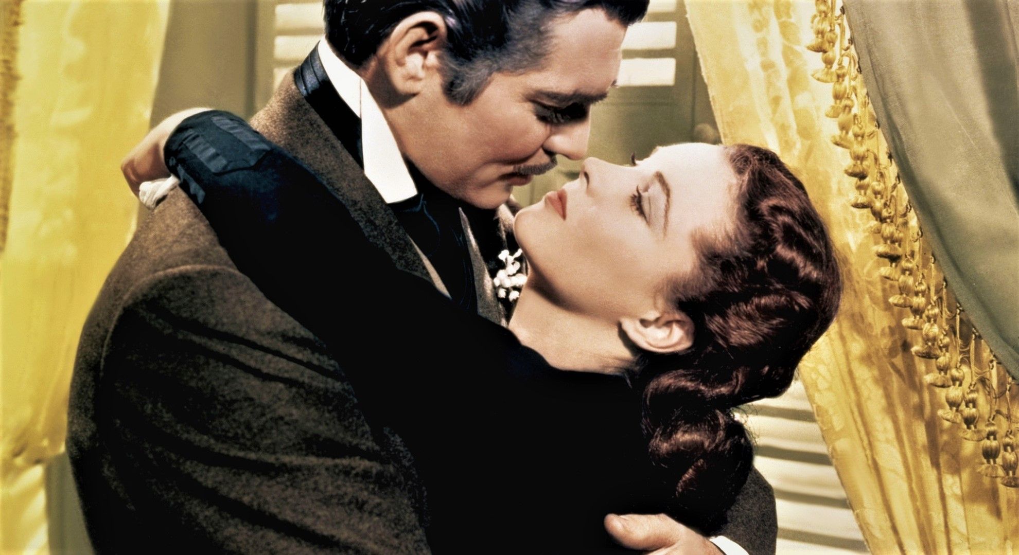 Clark Gable jako Rhett Butler i Vivien Leigh jako Scarlett O'Hara w filmie "Przeminęło z wiatrem"