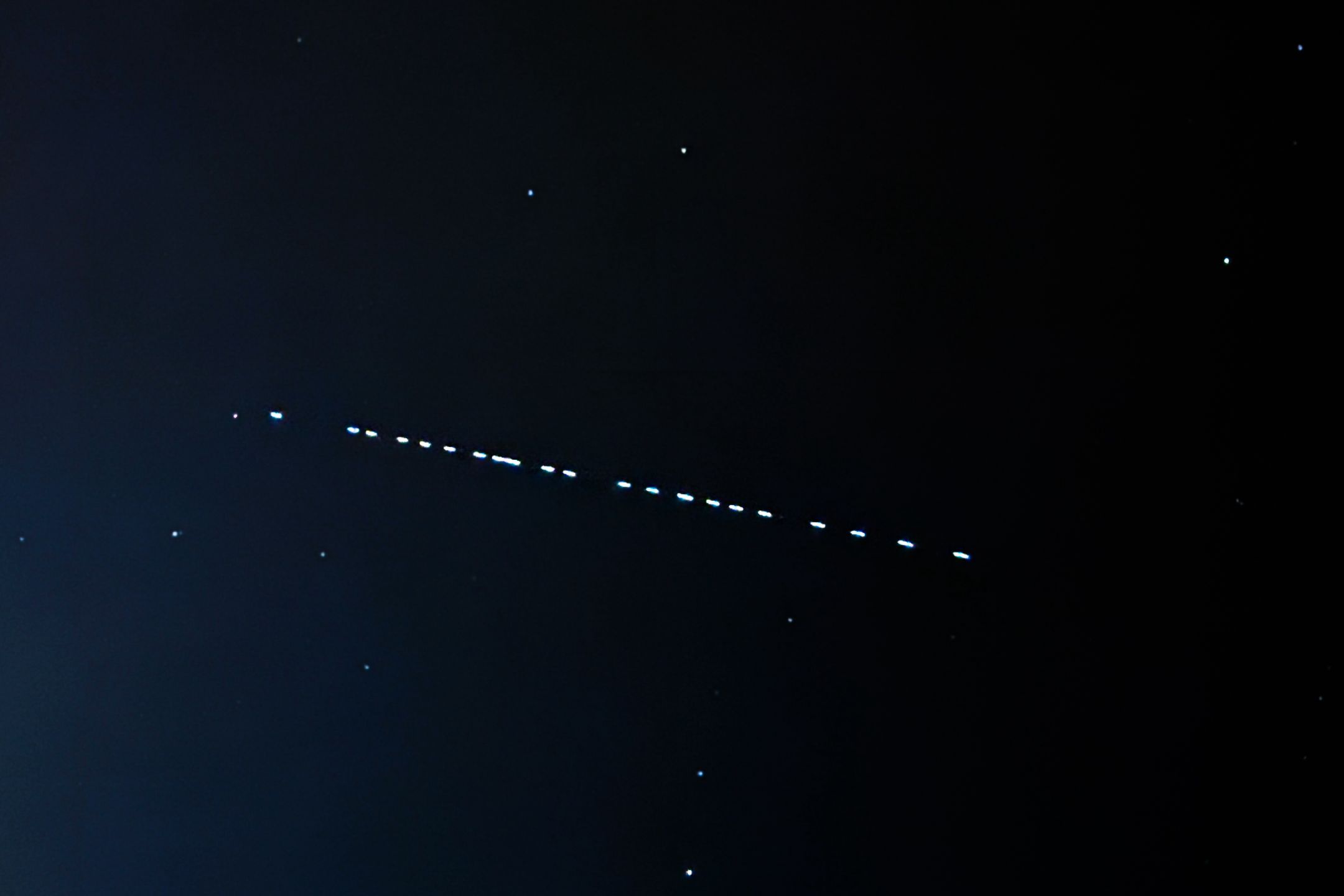 Starlink satellites passage is seen on the sky in southern Poland on November 1, 2024. (Photo by Jakub Porzycki/NurPhoto via Getty Images)