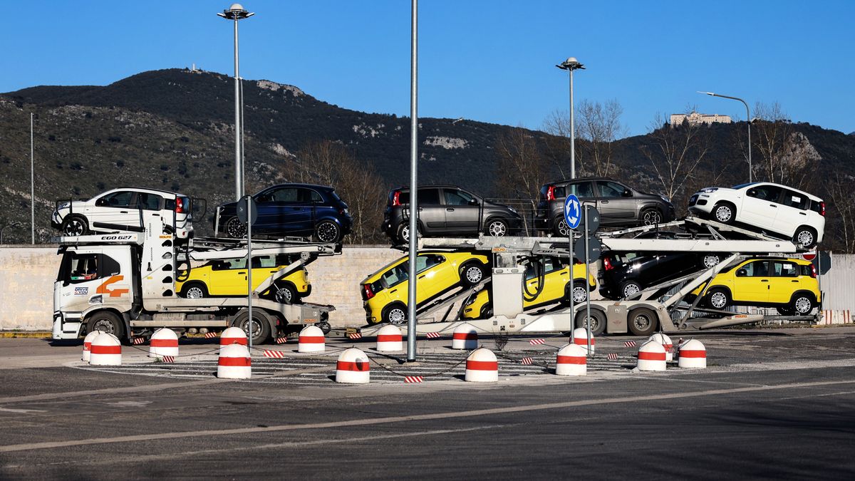 A vehicle transporter carrying new Fiat Chrysler Automobiles NV vehicles at the Stellantis NV factory in Cassino, Italy, on Thursday, Feb. 6, 2025. Auto stocks around the world slumped Monday after US President Donald Trump's new tariffs threatened to cut into sales from factories in Mexico and Canada. Photographer: Alessia Pierdomenico/Bloomberg via Getty Images