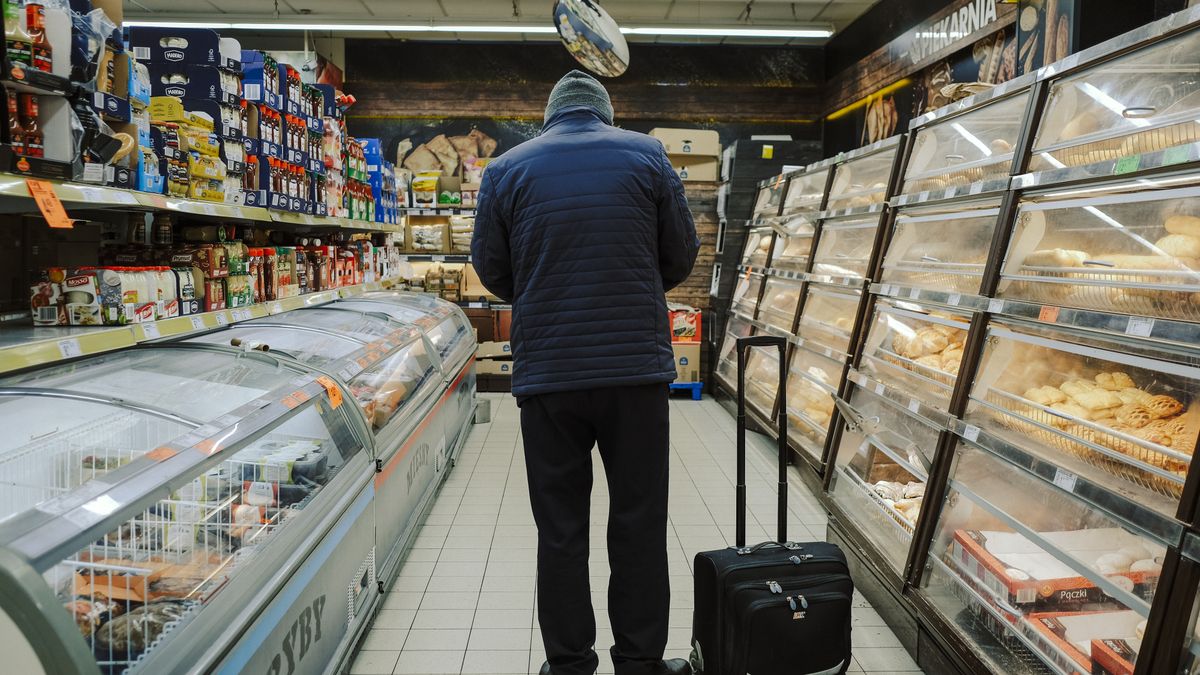A customer shops in a supermarket in Warsaw, Poland, on Wednesday, Jan. 4, 2023. Poland left borrowing costs unchanged as the threat of an economic recession overshadows concerns over the highest inflation in more than a quarter century. Photographer Damian Lemaski/Bloomberg via Getty Images