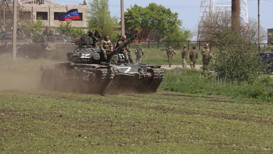 Evacuation of people from MariupolMARIUPOL, UKRAINE - MAY 06: Tanks of the DPR army move on the field during several dozen Ukrainian civilians, who had been living in the bomb shelters of the Azovstal plant for more than a month, being evacuated in Mariupol, Ukraine on May 06, 2022. The evacuated civilians were taken to a refugee camp in the village of Bezymyannoye. (Photo by Leon Klein/Anadolu Agency via Getty Images)Anadolu Agencyrussian attacks, dpr, evacuation of people