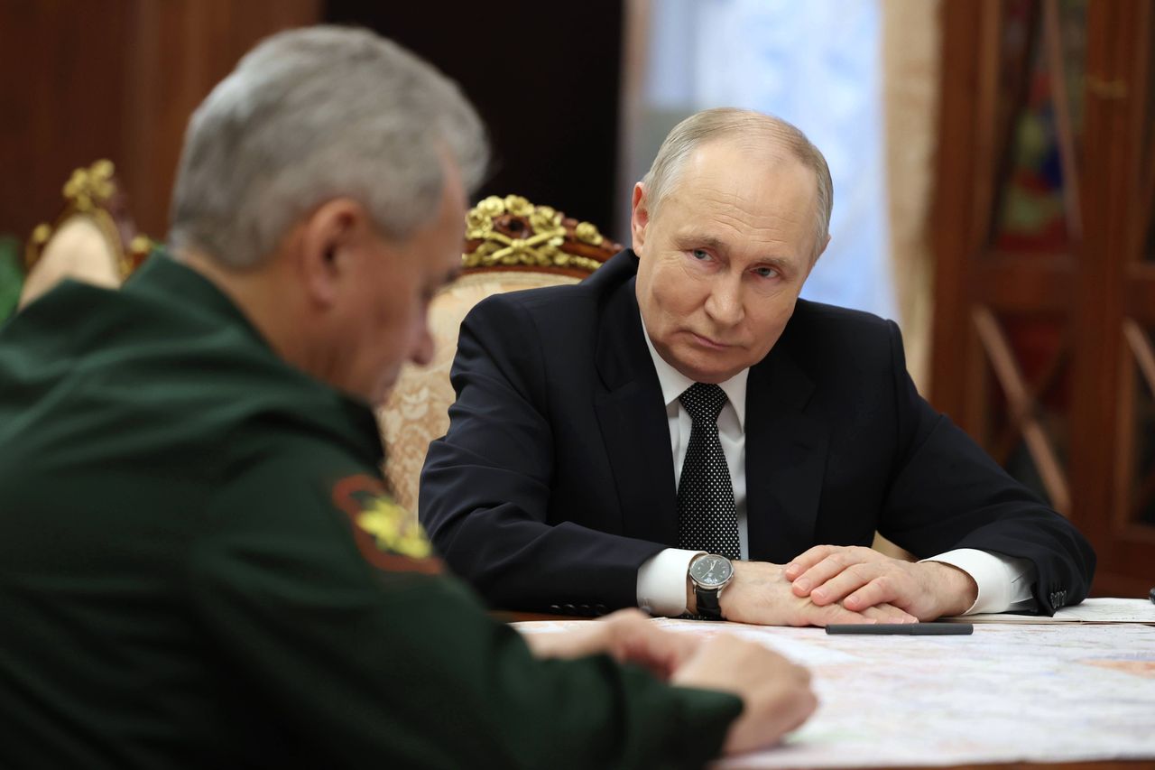 Vladimir Putin and Sergei Shoigu