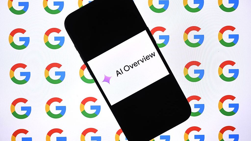 Google, AI Overview and AI Mode
ANKARA, TURKIYE - DECEMBER 10: In this photo illustration, AI Overviews logo is being displayed on a mobile phone screen in front of a computer screen displaying Google logos in Ankara, Turkiye, on December 10, 2025. (Photo by Rasit Aydogan/Anadolu via Getty Images)
Anadolu
google logo, display, ai language model, tools, stock photo, stockphoto, gadget, application, cloud, stock, tech, ai overviews logo, smartphone, code, software, app, ai overviews, emblem, machine learning (ml), ai algorithms, network, google, ai mode, images, ai mode logo, ai tool, search, ai