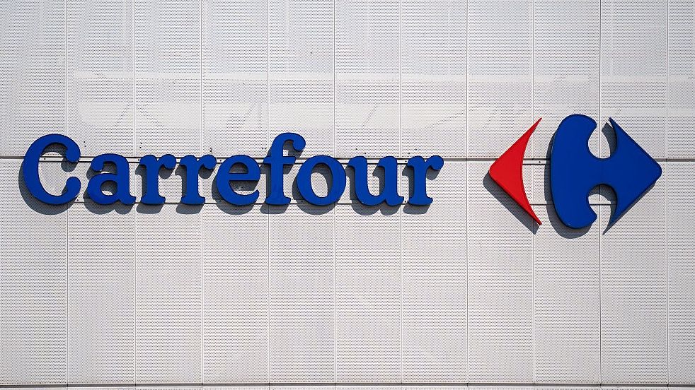 Daily Life In Krakow And Skawina, Poland.A Carrefour store with a logo sign is seen in Krakow, Poland, on May 10, 2026. Carrefour is a French supermarket chain and multinational retail corporation. (Photo by Marcin Golba/NurPhoto via Getty Images)NurPhotosignboard, emblem, logotype, market, grocery, brand, company, signage, consumer, branding, commercial, name, shop, chain, building, french, hypermarket, retailer