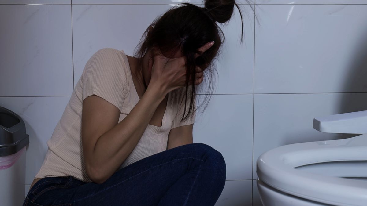 sexual harassment conceptThe depression asian woman sit on the floor in bathroom with sexual harassment conceptPonyWangharasser