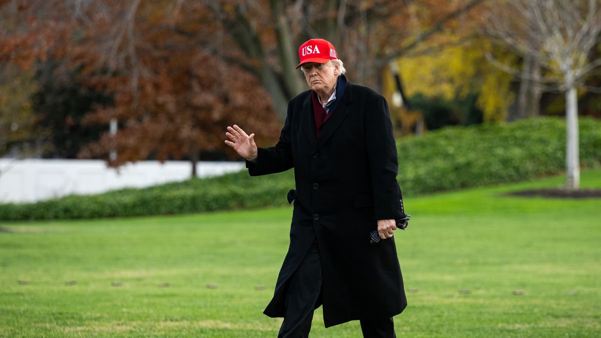 US President Donald Trump walks on the South Lawn of the White House after arriving on Marine One in Washington, DC, US, on Saturday, Nov. 22, 2025. US officials are having early discussions on whether to let Nvidia Corp. sell its H200 artificial intelligence chips to China, according to people familiar with the matter, a contentious potential move that would mark a major win for the world's most valuable company. Photographer: Graeme Sloan/Bloomberg via Getty Images