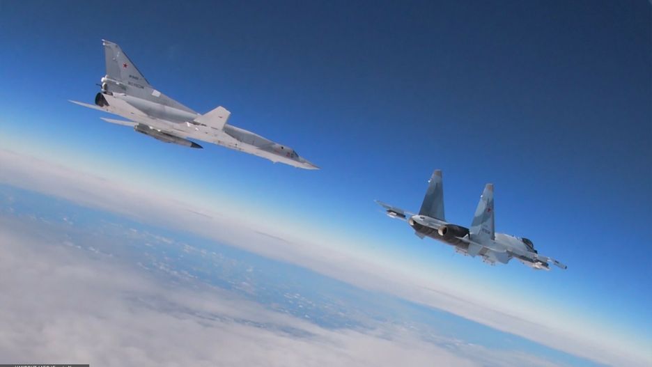 arch49
This handout video grab released by the Russian Defence Ministry on February 9, 2022 shows a Tupolev Tu-22M3 Backfire strategic bomber (L) and a  Su-35 multirole supermaneuverable fighter flying during joint exercises of the armed forces of Russia and Belarus as part of an inspection of the Union State's Response Force. - Russia and Belarus launched joint military drills despite concerns in Western countries that Moscow is plotting a major escalation of the conflict in Ukraine. The exercises, scheduled to continue until February 20 in Belarus, had begun and would centre around "suppressing and repelling external aggression," Russia's defence ministry said in a statement. (Photo by Handout / Russian Defence Ministry / AFP) / RESTRICTED TO EDITORIAL USE - MANDATORY CREDIT "AFP PHOTO /Russian Defence Ministry " - NO MARKETING - NO ADVERTISING CAMPAIGNS - DISTRIBUTED AS A SERVICE TO CLIENTS
HANDOUT