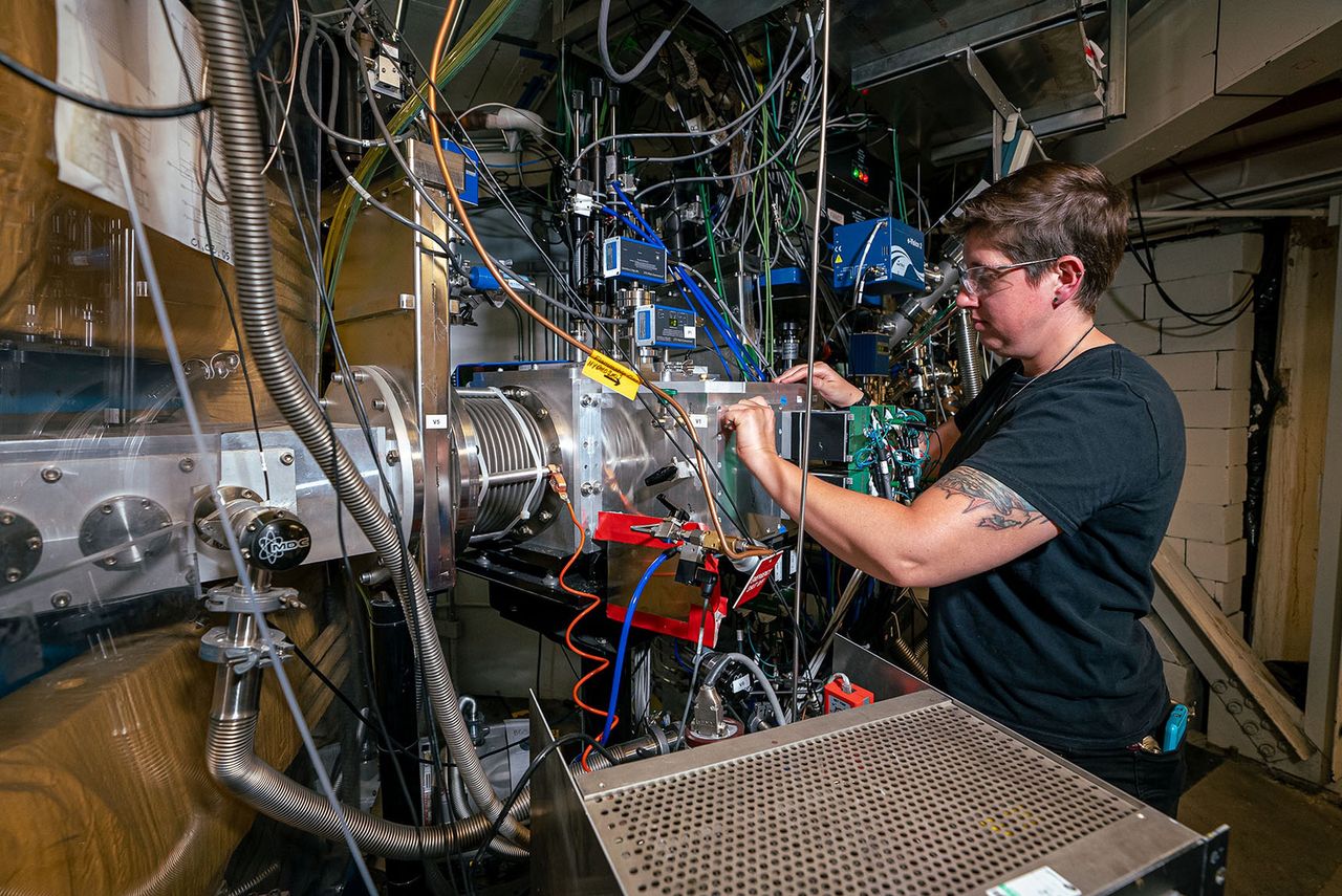 Scientist Jacklyn Gates in a gas-filled separator in Berkeley used to separate atoms of element 116.