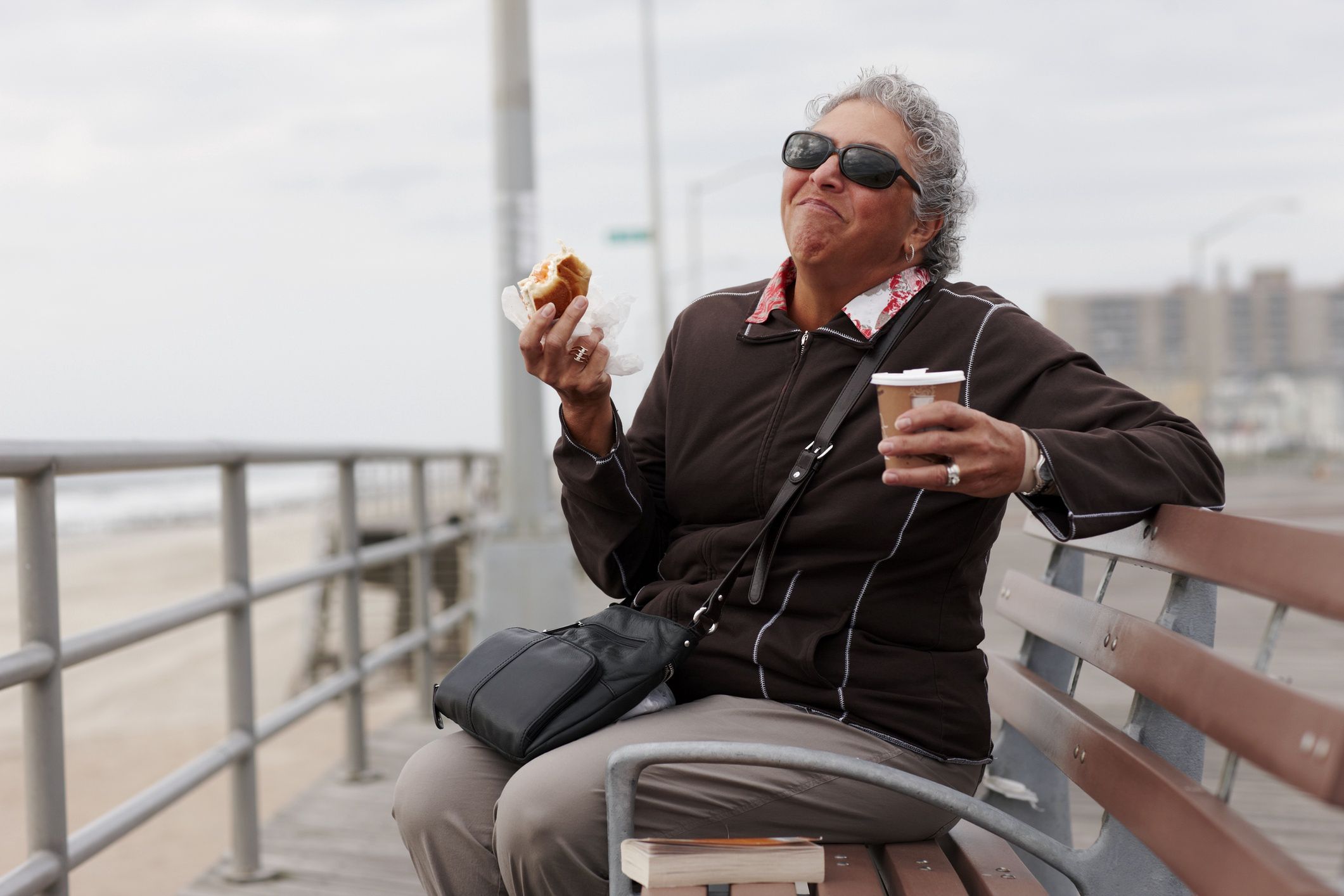Women eating pastry and drinking coffee on boardwalk
Granger Wootz
65-69 years, active seniors, aging, beach, bench, carefree, coffee, coffee cup, color image, copy space, day, disposable cup, drinking, eating, food and drink, fun, gray hair, happy, holding, horizontal, humor, lifestyle, nature, new york, one person, outdoors, people, photography, portrait, posing, purse, queens, railing, relaxation, retirement, sandwich, senior adult, senior women, side view, sitting, smiling, sunglasses, surprise, take out food, three quarter length, travel, travel destinations, united states, vitality, woman
