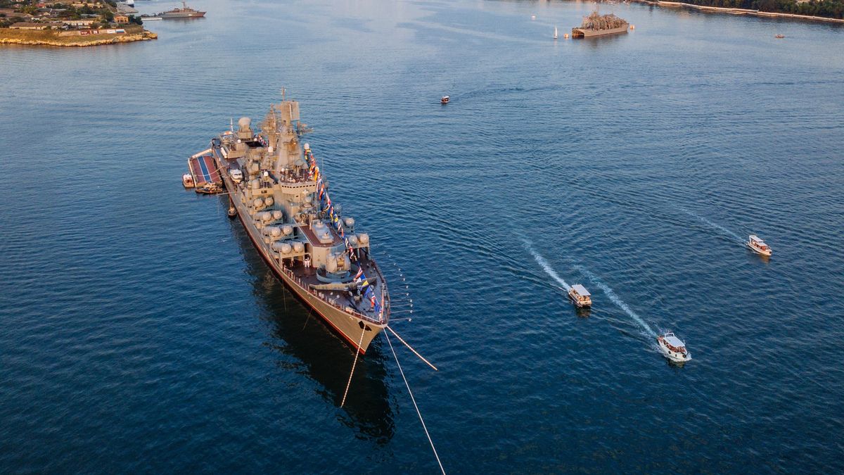 Russian military ship in Sevastopol bay at Navy day, aerial viewRussian fleet parade in Sevastopol bay at Navy day, aerial view.Vladimir Zapletinflagship