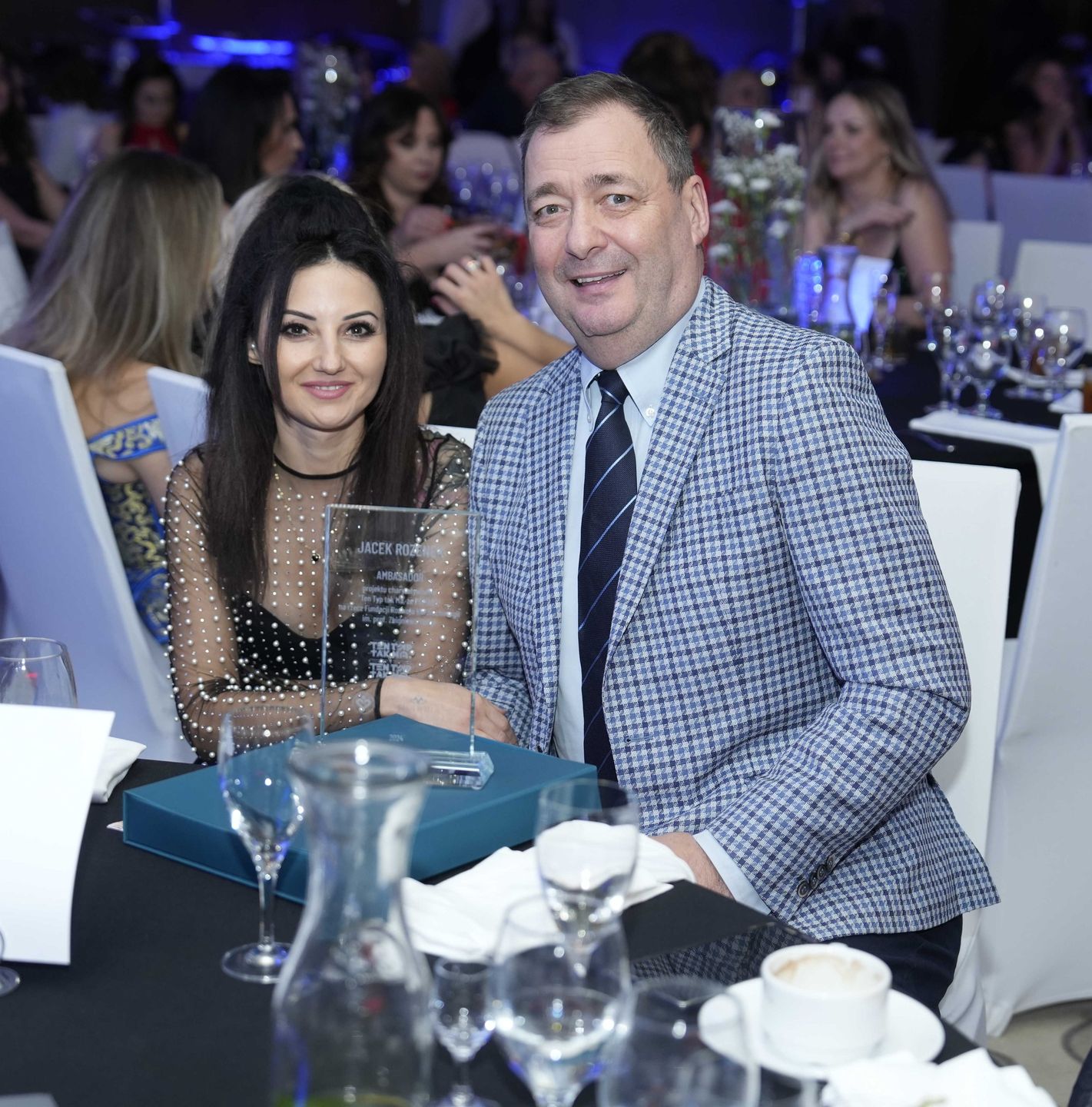 Jacek Rozenek z partnerką 