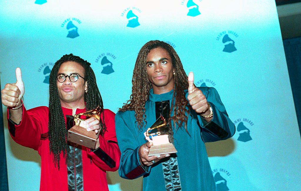 Milli Vanilli Posing with Grammy Award(Original Caption) Los Angeles: Members of the group Milli Vanilli give a thumbs up as they pose for photographers at the Grammy Awards. The group was given the Grammy for Best New Artist.Bettmanntwo people:CB2, famous:CB1, music:CB2, celebrities:CB2, customs and celebrations:CB1, Los Angeles:CB2