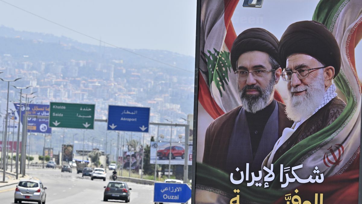 BEIRUT, LEBANON - JUNE 21: Billboards featuring the late former Iranian leader Ali Khamenei and his son Mojtaba Khamenei, who were killed in U.S. and Israeli attacks against Iran on February 28, are displayed on the Rafic Hariri International Airport highway with the text reading 'Thank you, loyal Iran' in Beirut, Lebanon on June 21, 2026. (Photo by Houssam Shbaro/Anadolu via Getty Images)