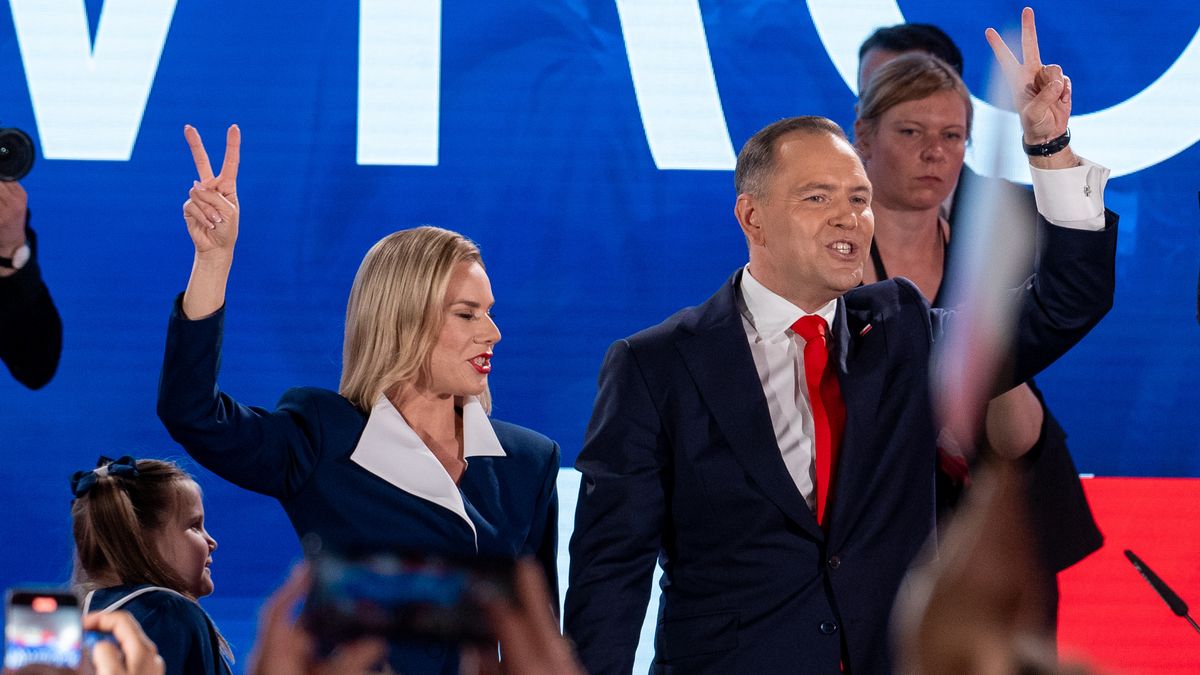 WARSAW, POLAND - 2025/06/01: Karol Nawrocki, presidential candidate of the Law and Justice Party (PiS), stands on stage with his wife Marta and their children as they gesture to supporters following the Polish presidential runoff election. Today's election is a closely contested race between PiS candidate Karol Nawrocki and Rafal Trzaskowski, the liberal mayor of Warsaw who is supported by Prime Minister Donald Tusk. The election is seen as a test of whether the government, with its centrist parliamentary coalition, can overcome the right-wing populism embodied by PiS. (Photo by Marek Antoni Iwaczuk/SOPA Images/LightRocket via Getty Images)