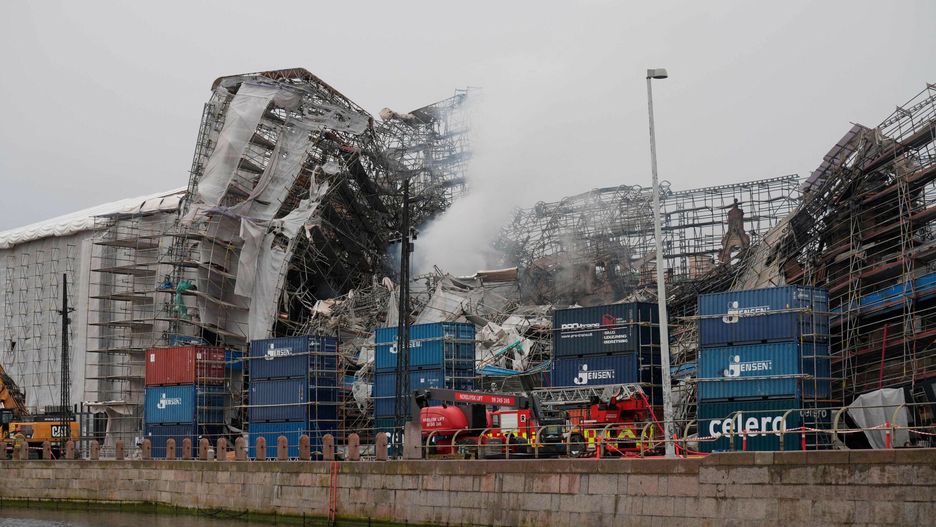 Temporary
A photo shows the ruins after the outer wall has collapsed in a fire in the historical Boersen building, the former Stock Exchange in Copenhagen, on April 19, 2024. Tuesday morning a fire was reported in the historic building in Copenhagen, which was under renovation. It was expected that the renovation would be completed in the autumn of 2024 in connection with the celebration of Boersen's 400-year anniversary. The building was erected in the 1620s as a trading building by King Christian IV. Today, the building is owned by Dansk Erhverv, and has served as an office building. (Photo by Emil Helms / Ritzau Scanpix / AFP) / Denmark OUT
EMIL HELMS