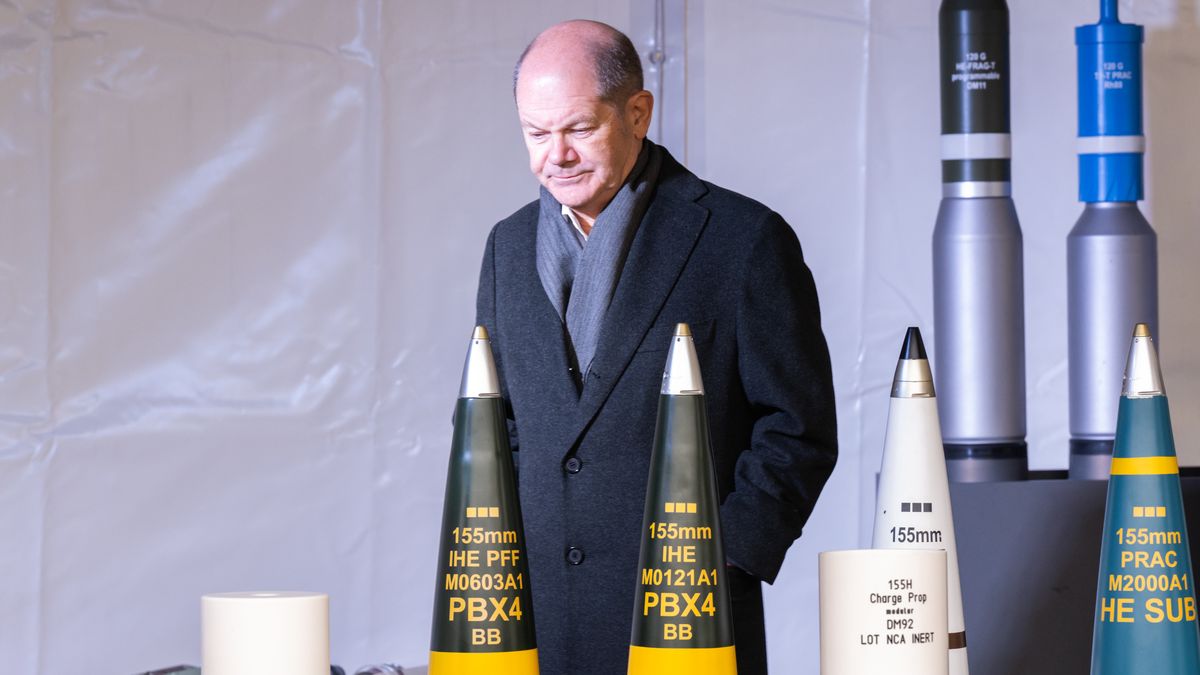 UNTERLUESS, GERMANY - FEBRUARY 12: German Chancellor Olaf Scholz with artillery ammunition before the groundbreaking ceremony for a new munitions factory of German defence contractor Rheinmetall on February 12, 2024 in Unterluess, Germany. The war in Ukraine has been a boon to Rheinmetall as Germany seeks to provide Ukraine with munitions, including artillery shells, and also increase its own supply. (Photo by David Hecker/Getty Images)