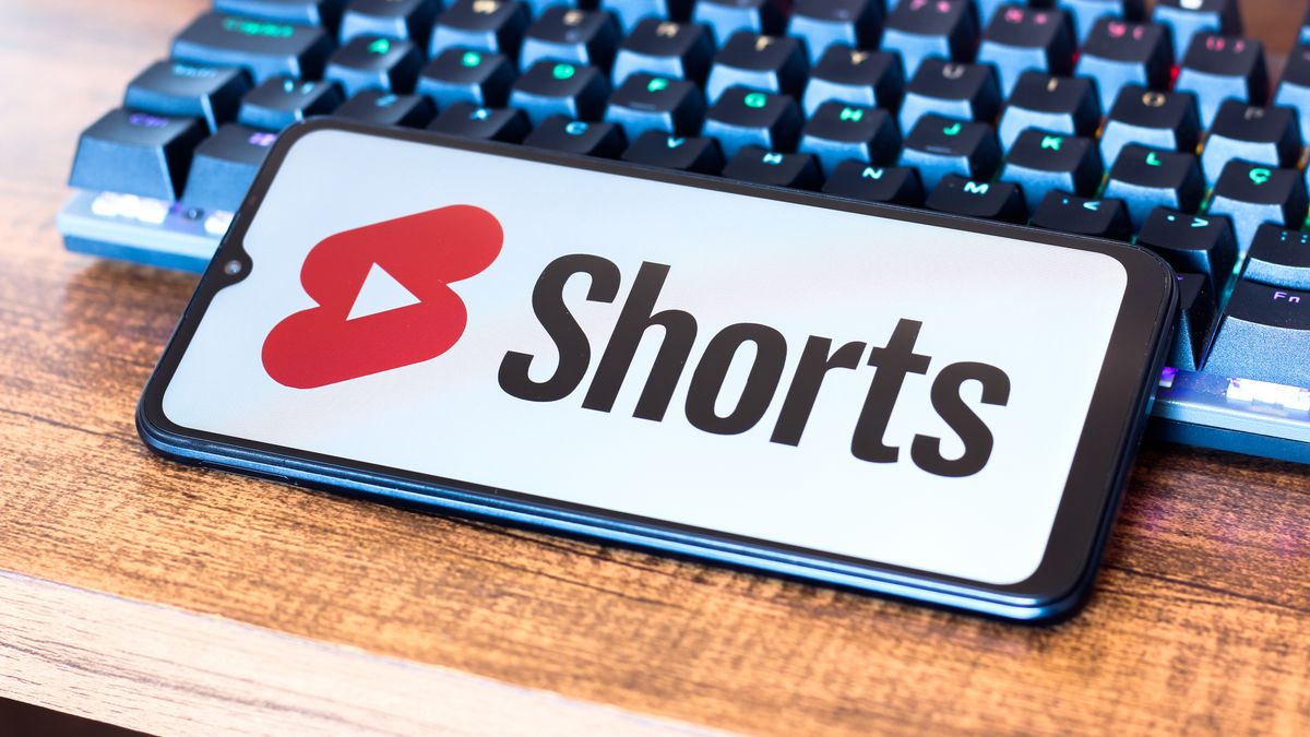 CANADA - 2025/01/10: In this photo illustration, the YouTube Shorts logo is seen displayed on a smartphone screen next to a keyboard. (Photo Illustration by Thomas Fuller/SOPA Images/LightRocket via Getty Images)