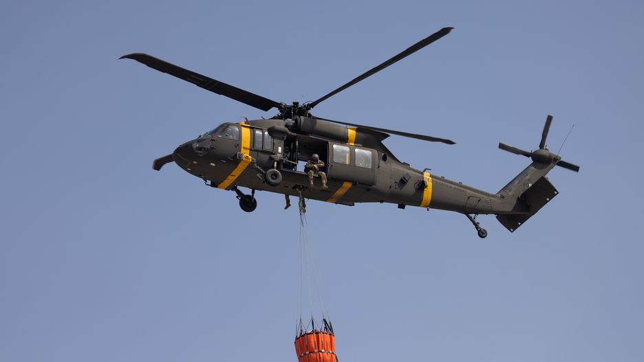 A Sikorsky UH-60 Black Hawk helicopter from US army during a joint live-fire exercise with South Korean army at Rodriguez Range in Pocheon, South Korea, on Wednesday, March 22, 2023. South Koreas defense ministry said in a statement Wednesday that the country plans to hold its largest-ever live-fire drills with the US in June in a move certain to anger North Korea, which has ramped up its provocations to new levels in response to recent military exercises. Photographer: SeongJoon Cho/Bloomberg via Getty Images