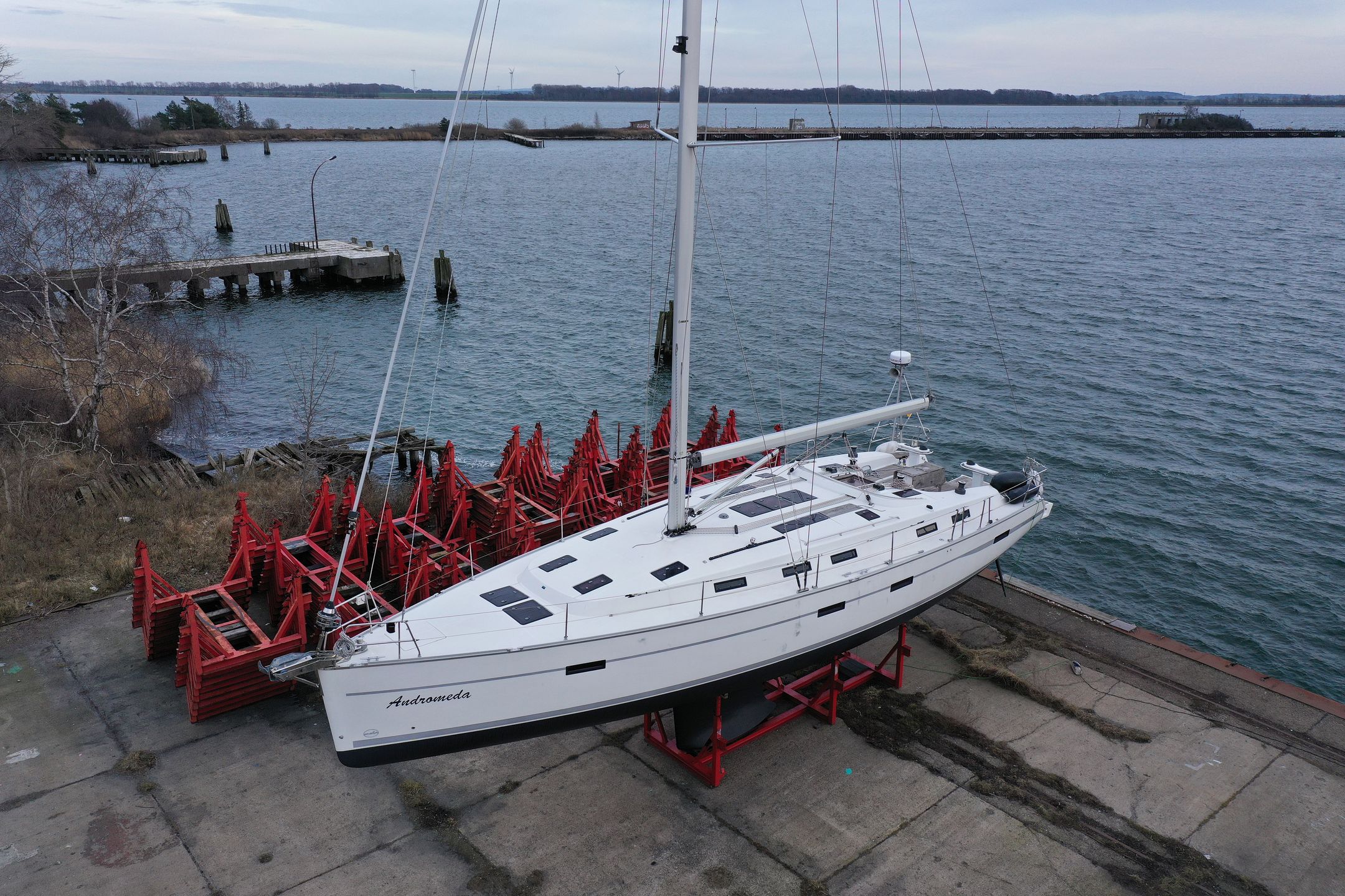 DRANSKE, GERMANY - MARCH 17: In this aerial view the Andromeda, a 50-foot Bavaria 50 Cruiser recreational sailing yacht, stands in dry dock on the headland of Bug on Ruegen Island on March 17, 2023 near Dranske, Germany. According to media reports, German investigators searched the boat recently and suspect a six-person crew used it to sail to the Baltic Sea and plant explosives that detonated on the Nord Stream pipeline in September of 2022, causing extensive damage. Investigators reportedly found traces of explosives on the table inside the yacht. While initial findings point to a possible Ukrainian connection to the sabotage operation, many questions remain open.  (Photo by Sean Gallup/Getty Images)