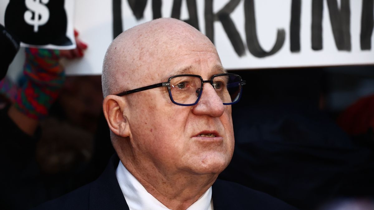 Chairman Sylwester Marciniak speaks to the media after the National Electoral Commission meeting, as people gather to protest near the commision headquarters in Warsaw, Poland on December 30, 2024. (Photo by Jakub Porzycki/NurPhoto via Getty Images)
