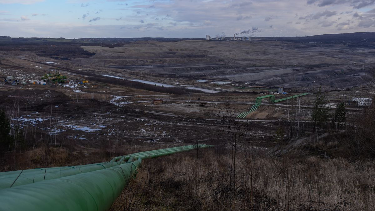 BOGATYNIA, POLAND - FEBRUARY 11: Giant tubes enter  the Turow open-pit lignite coal mine on February 11, 2020 in Bogatynia, Poland. The operating license for the Turow open pit coal mine expires in March 2020, which PGE, Poland's state-owned public power company plans to renew until 2044 through an expansion of the existing huge open-pit mine.  The Turow mine expansion is expected to increase the total surface area of the pit to 30 km2 while extending the mining operation to just 70m from the Czech border.(Photo by Omar Marques/Getty Images)