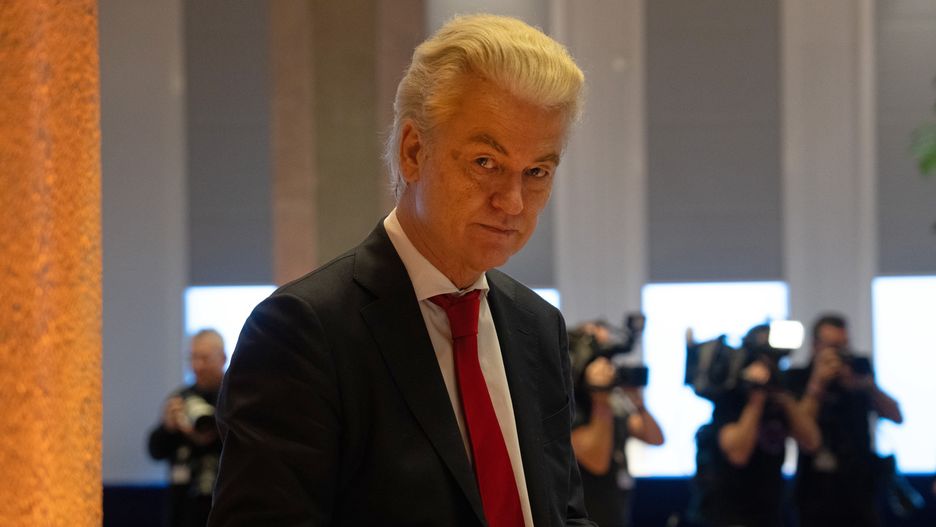 THE HAGUE, NETHERLANDS - NOVEMBER 24: Geert Wilders, Dutch right-wing politician and leader of the Party for Freedom (PVV), checks his phone as he attends a meeting in the Dutch parliament with party leaders to discuss the formation of a coalition government following his victory in Wednesday's general election, on November 24, 2023 in The Hague, Netherlands. The Netherlands' right-wing, anti-EU leader Geert Wilders won the most votes in parliamentary elections on November 22, and will now face the country's political parties to form a government. (Photo by Carl Court/Getty Images)