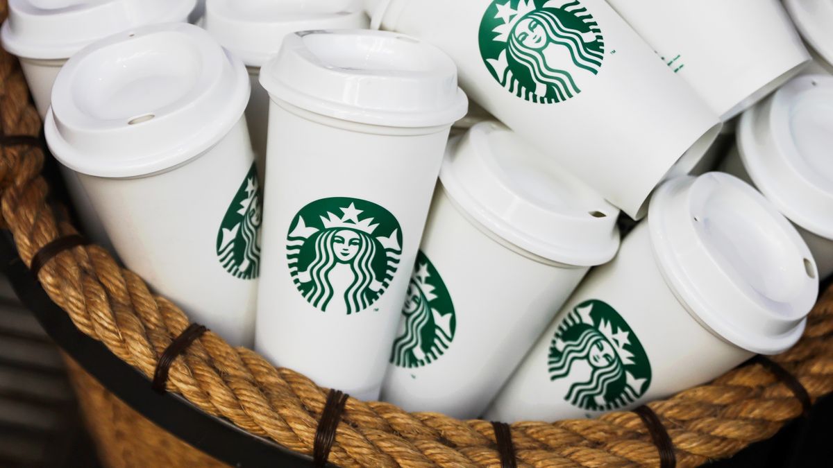 Starbucks Coffee logo is seen on cups at the cafe in Krakow, Poland on February 13, 2022. (Photo by Jakub Porzycki/NurPhoto via Getty Images)