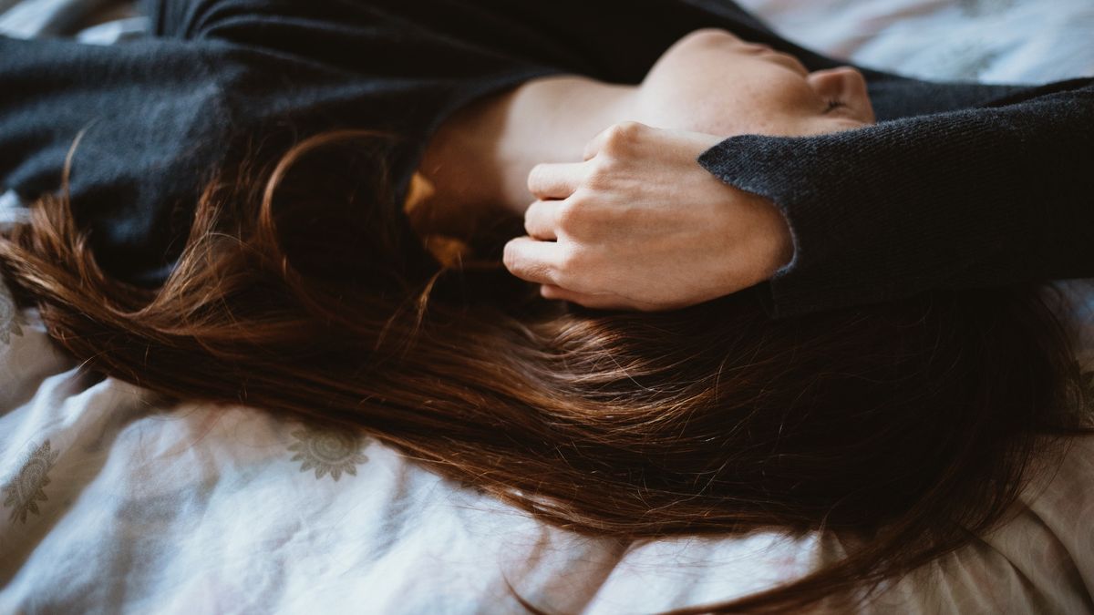 A woman sleeping
A woman lying/sleeping on her back on the bed with her hand/arm over her head
Photographer, Basak Gurbuz Derma
